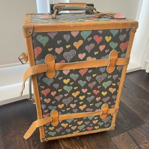 Black with hearts roller suitcase